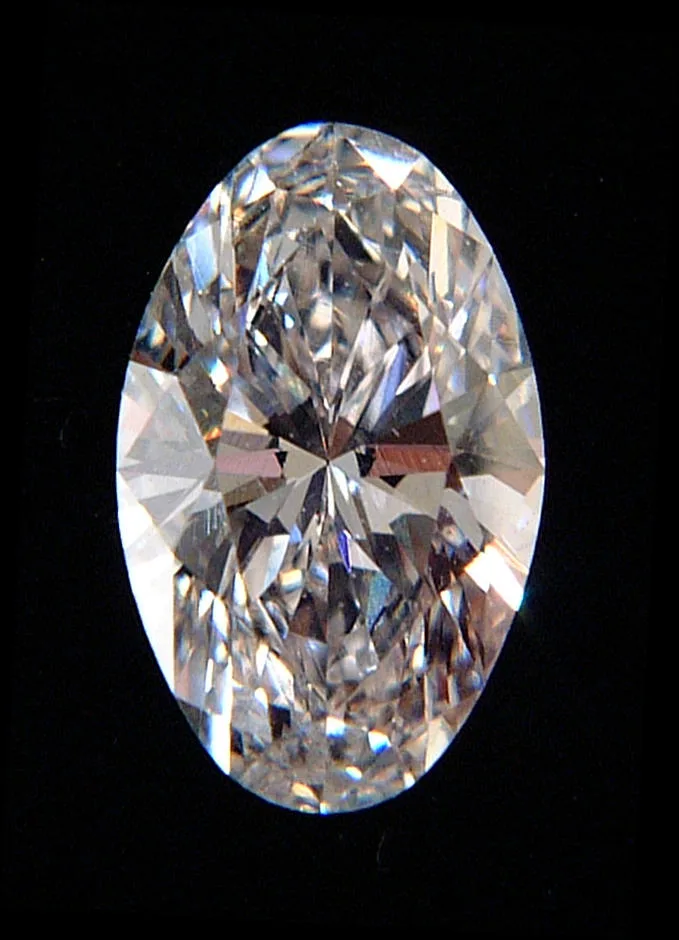Loose oval-cut diamond photographed face-up
